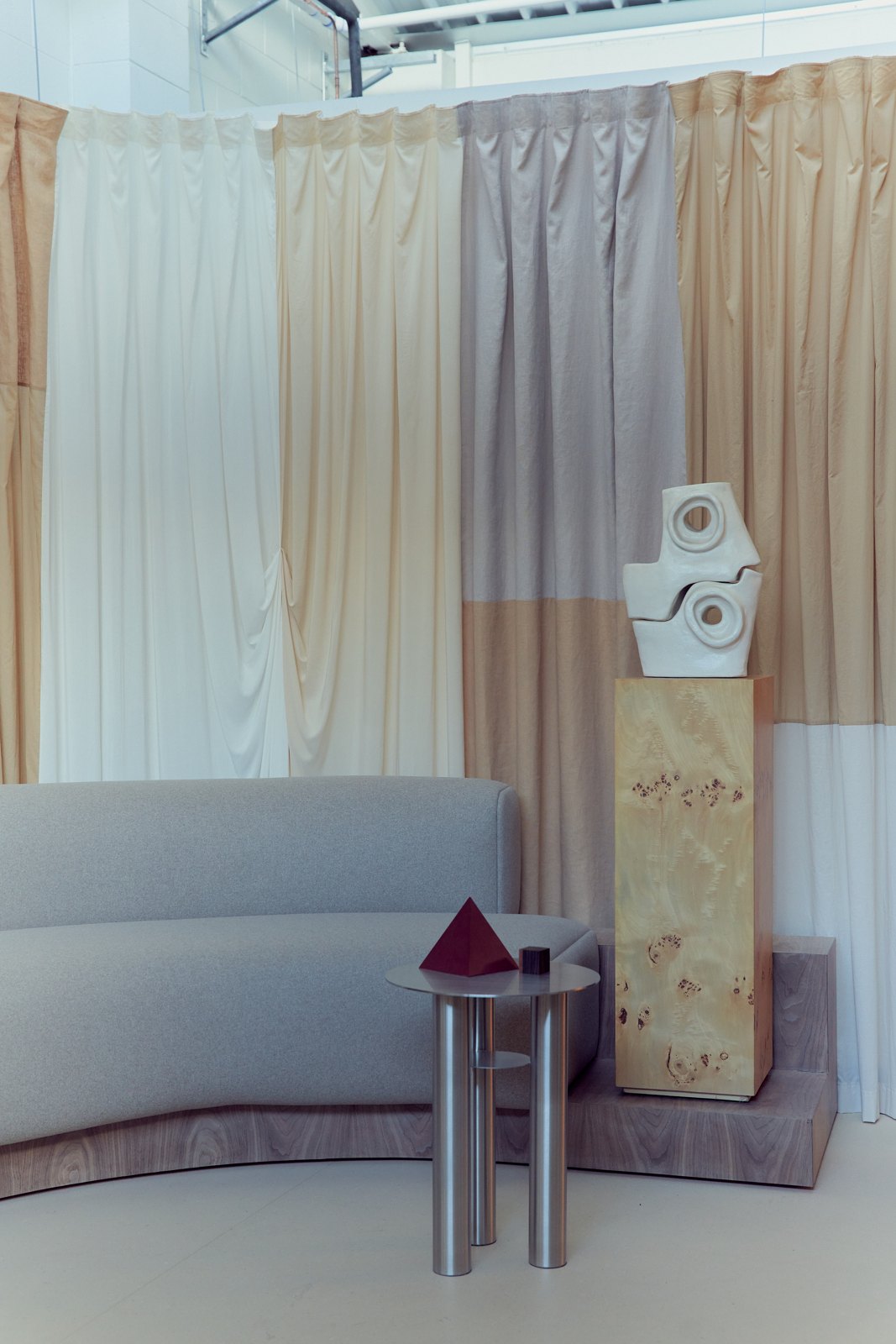 The curtained lounge with sculpture