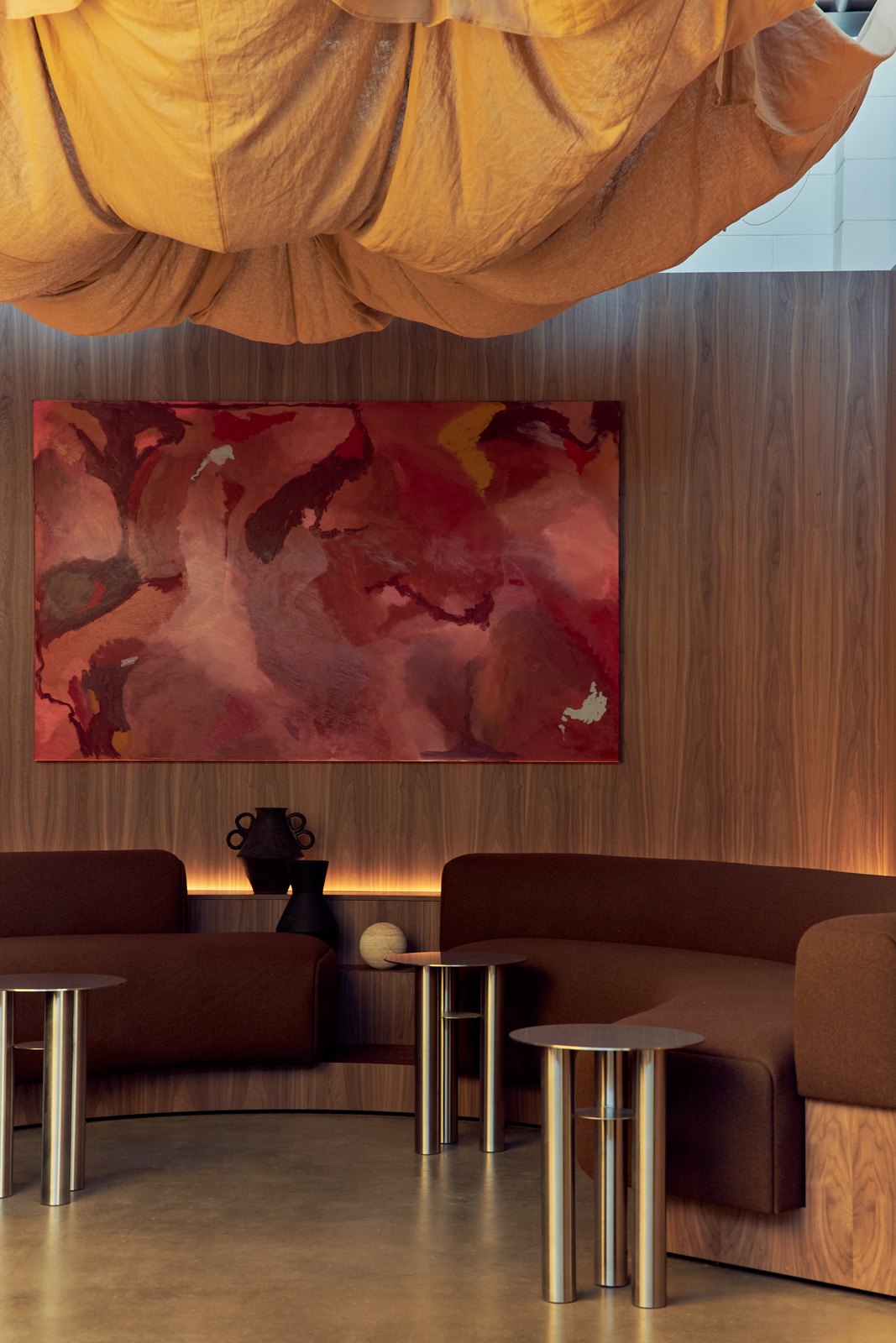 The curved lounge with its red artwork